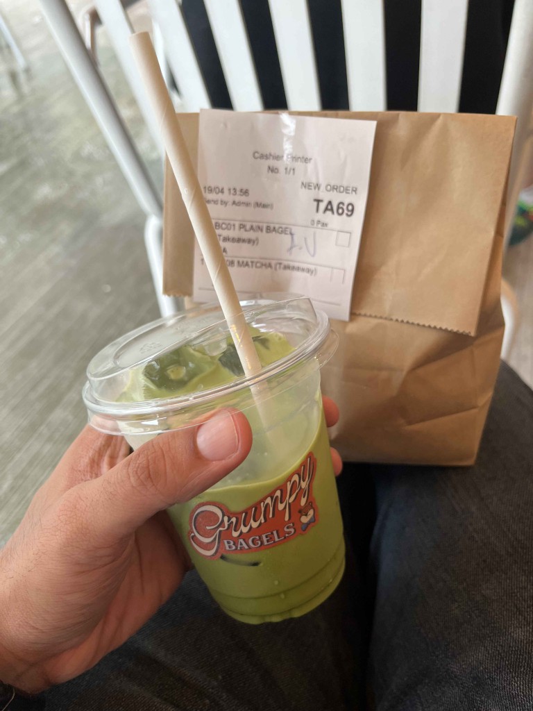 matcha tea and bagel at Grumpy Bagels
