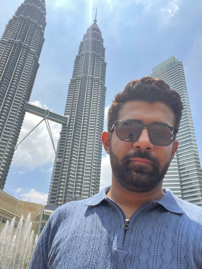 sunny selfie in front of the Petronas